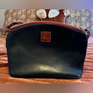 Dooney & Bourke Black Leather Crossbody with Brown Trim and Red Zipper